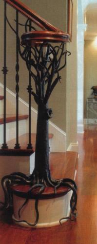 Forged and sculpted newel post tree